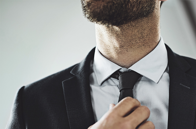 Business man with beard on chin and neck