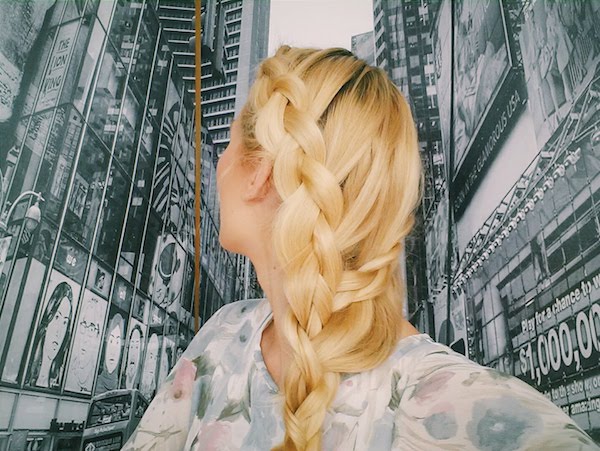 Video blonde woman with Wiesn hairstyle, braid