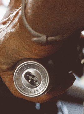Man holds hair trimmer No 622 in left hand looks like a motorcycle grip